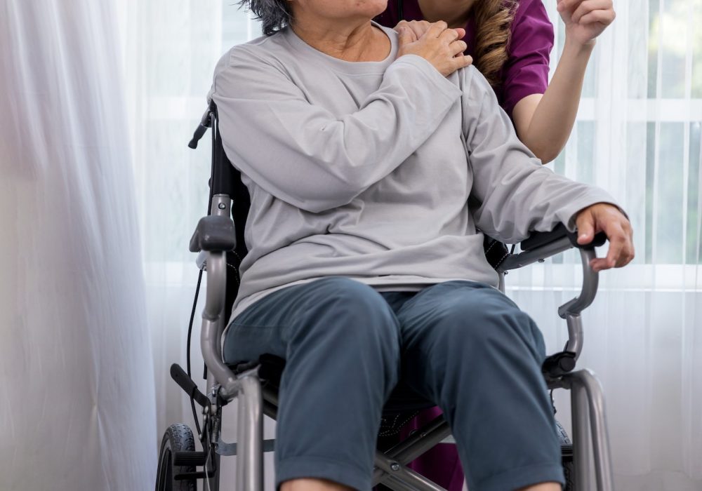 caregiver-nurse-take-care-a-senior-patient-sit-on-wheelchair-nurse-helping-senior-woman.jpg