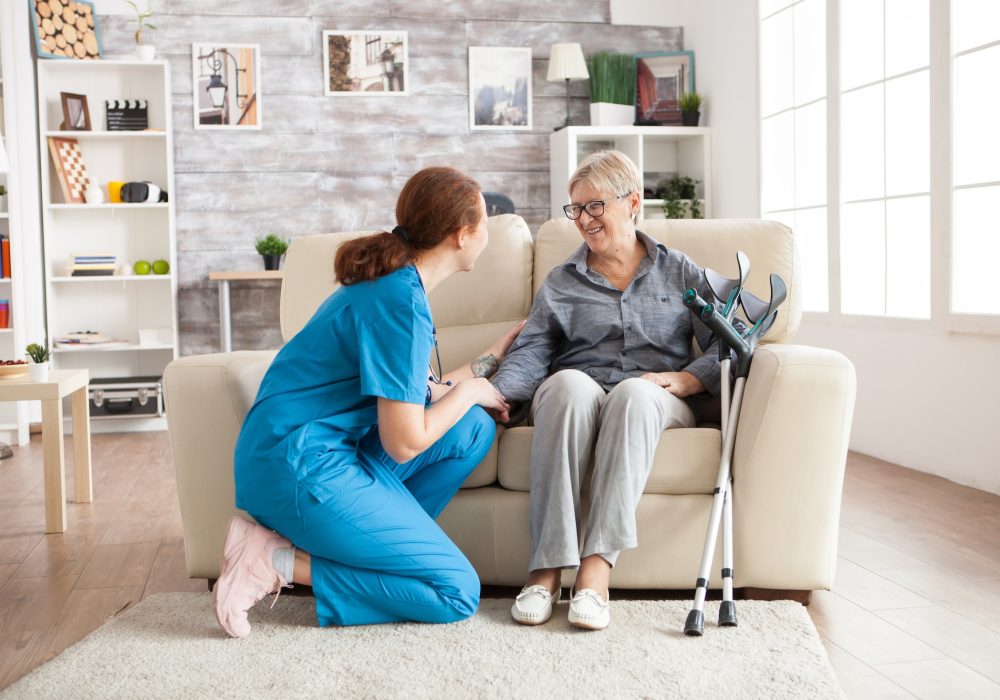 female-nurse-talking-with-an-old-woman.jpg